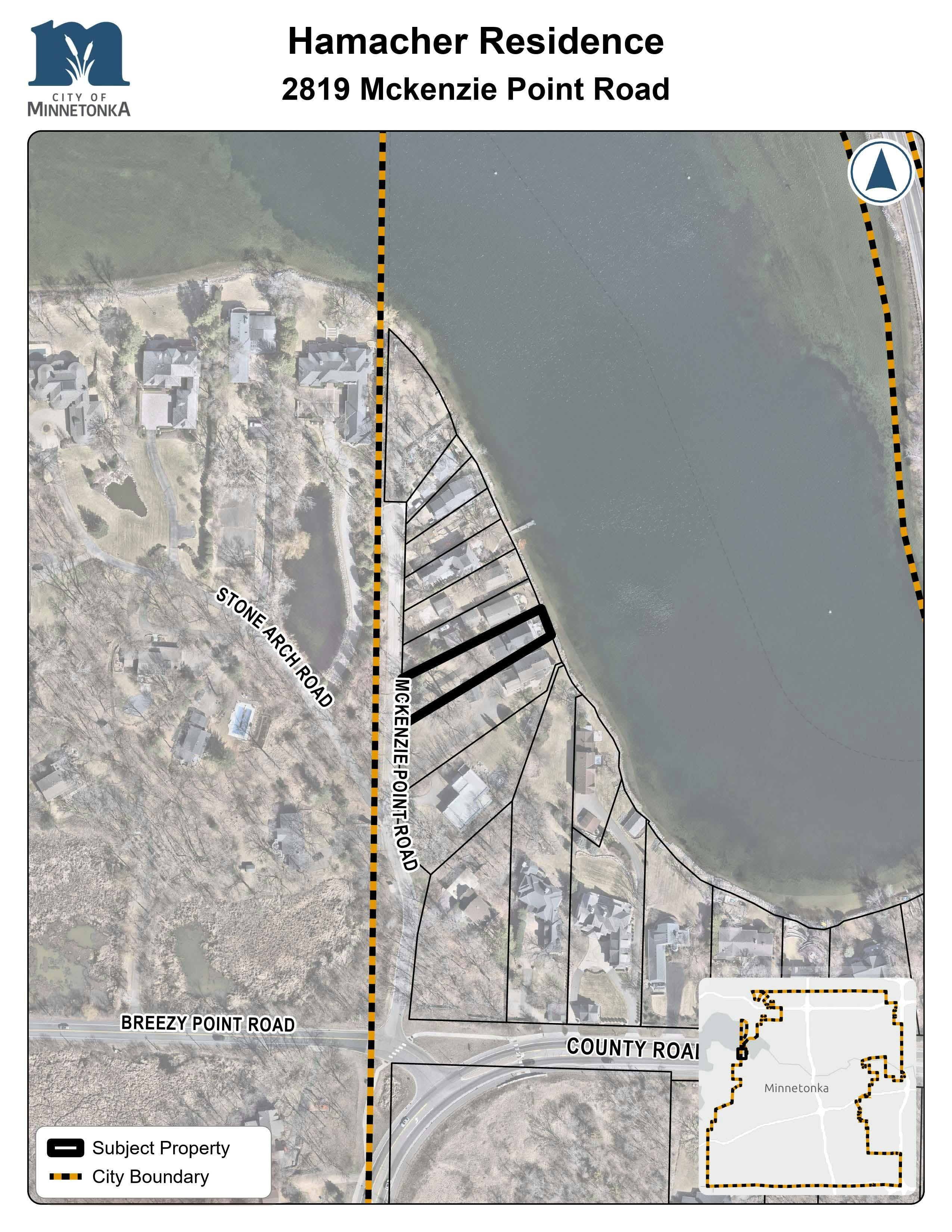A map showing the subject property outlined in black along McKenzie Point Road, adjacent to the shoreline. Nearby streets include Stone Arch Road and County Road 101. The city boundary is marked with a dashed line.