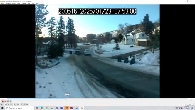 Car and a truck pass successfully in the narrowest part of the Pinal road following sidewalk construction.
