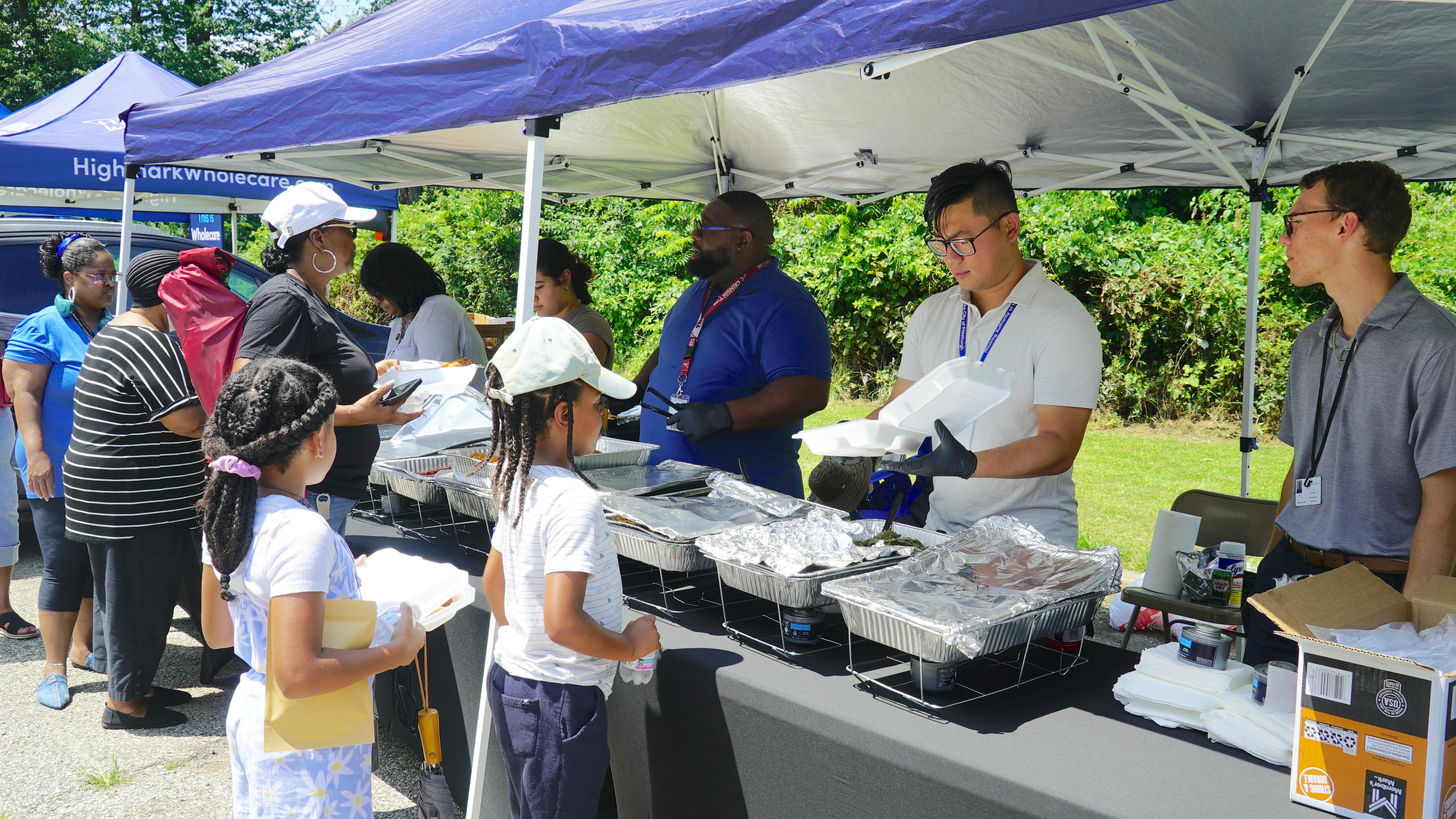 Arlington Heights residents enjoy the food at a recent Community Day event.