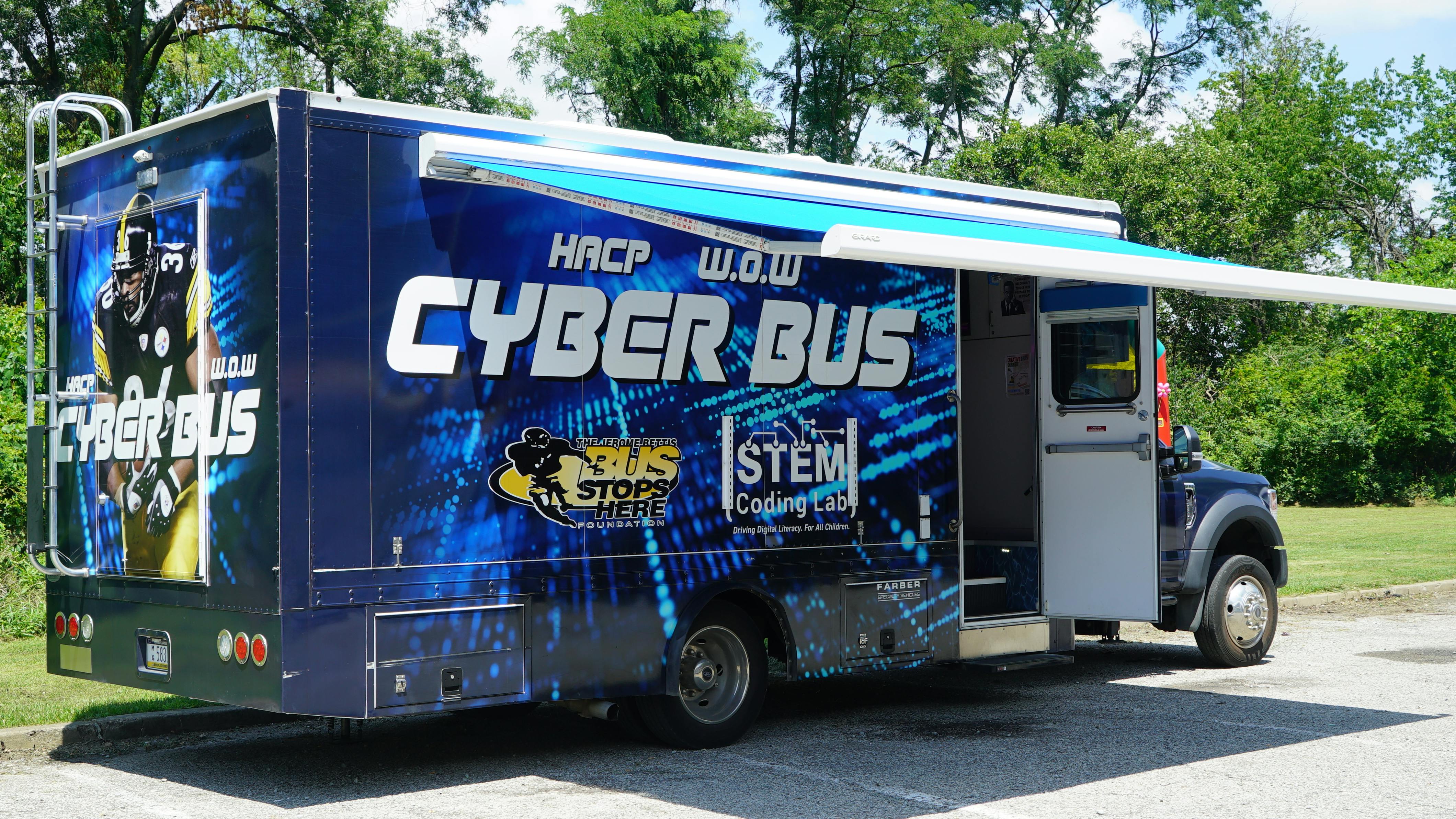 The W.O.W. CyberBus mobile computer lab gives hands-on instruction at all HACP Community Day events.