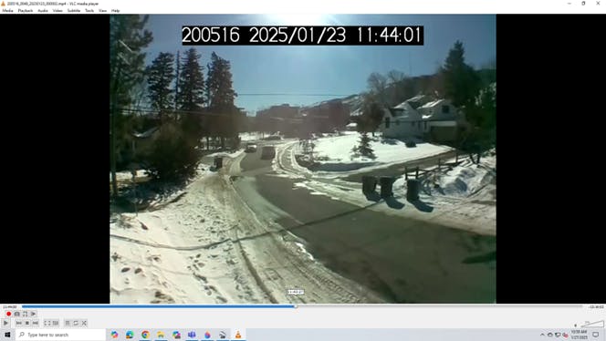 Two cars pass successfully in the narrowest part of the Pinal road following sidewalk construction.