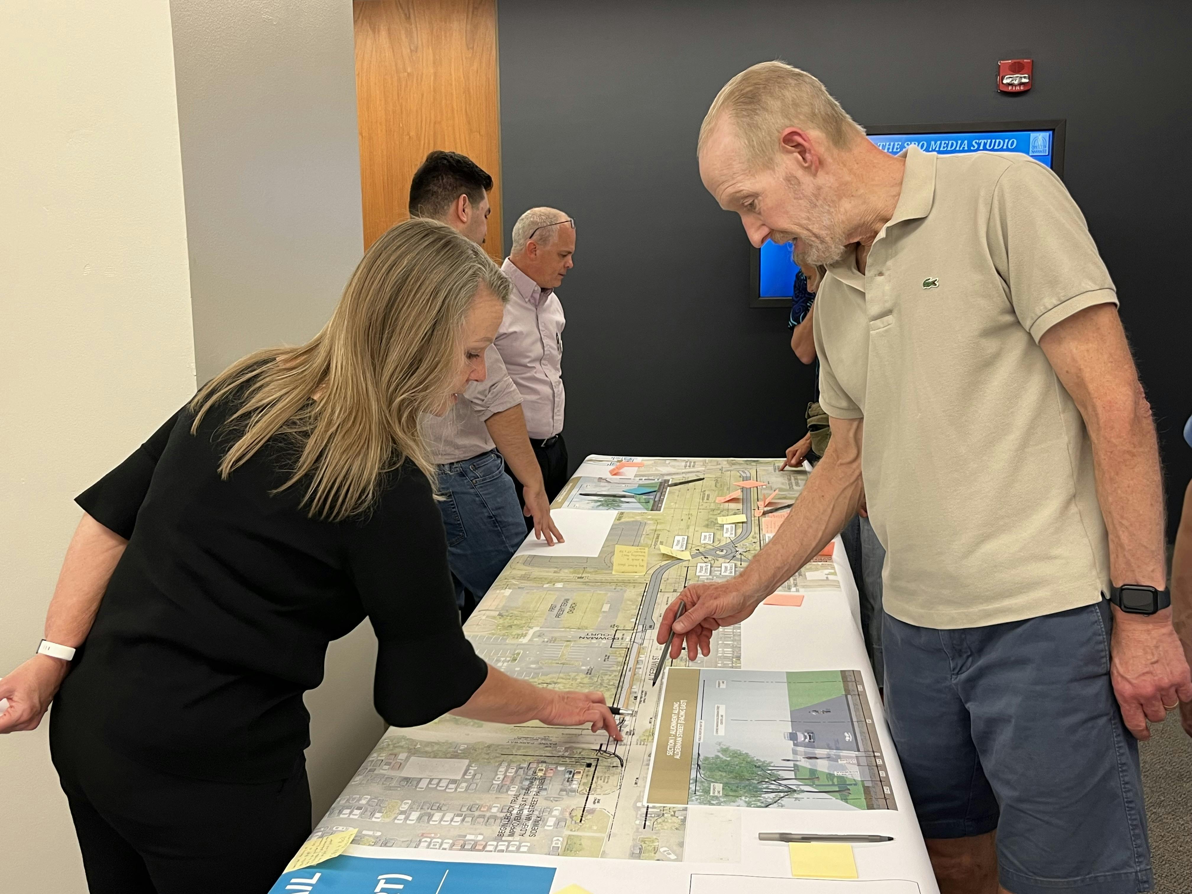 Participant learns more about the trail project. 