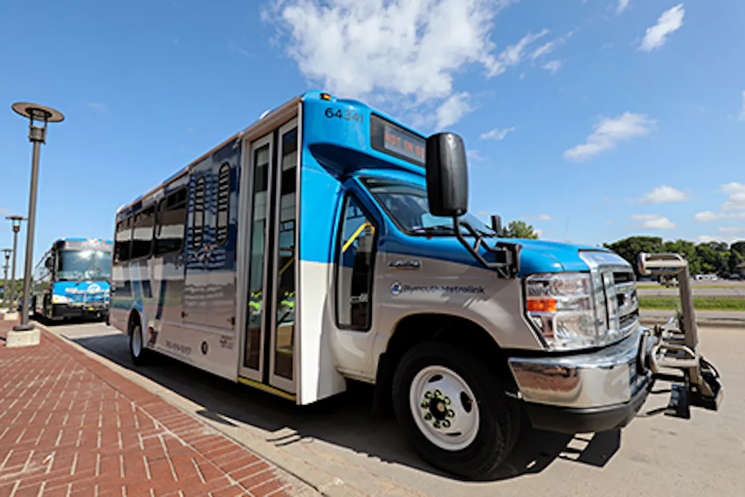 picture of a white and blue small bus 