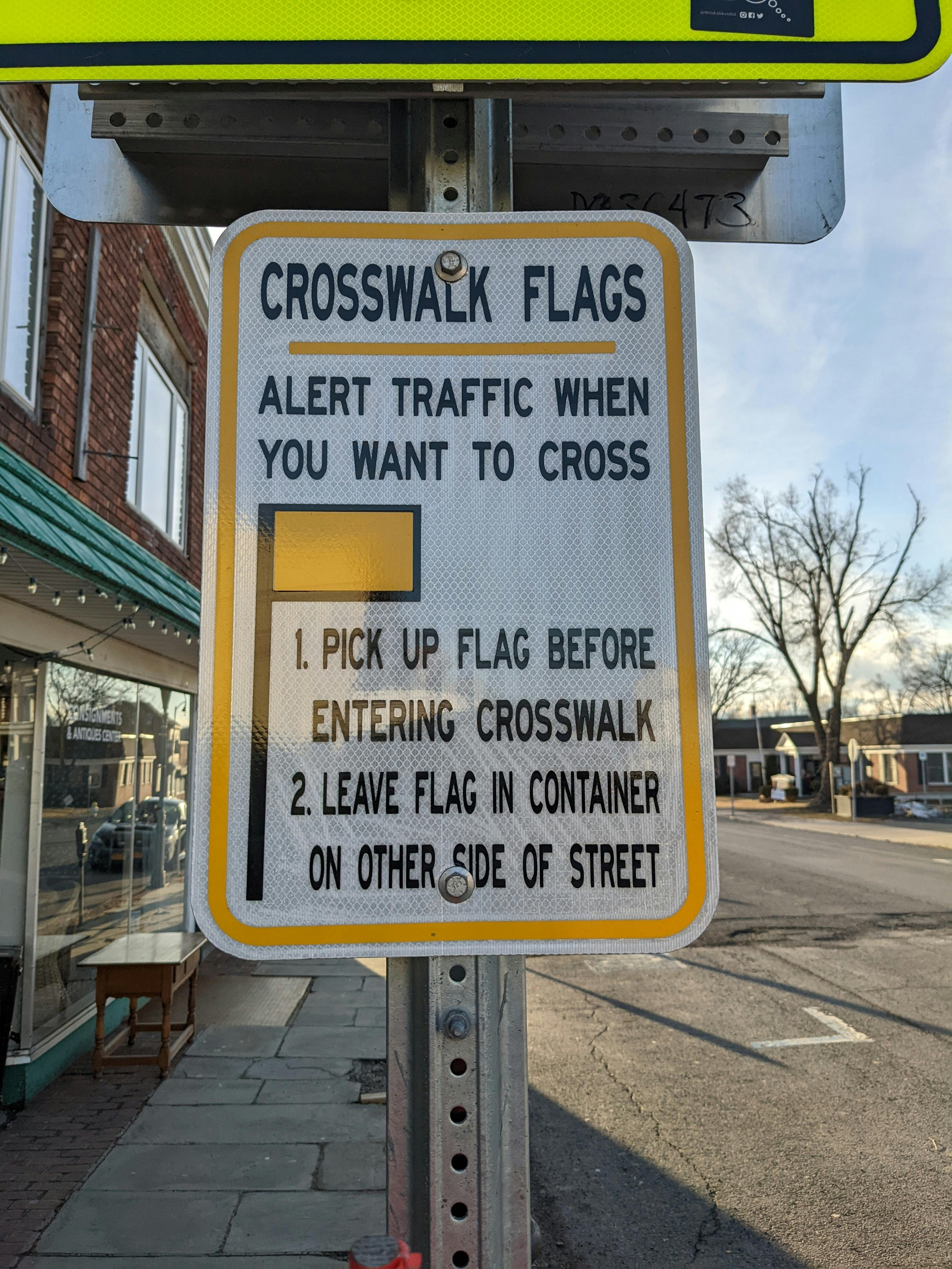 Crosswalk flag sign