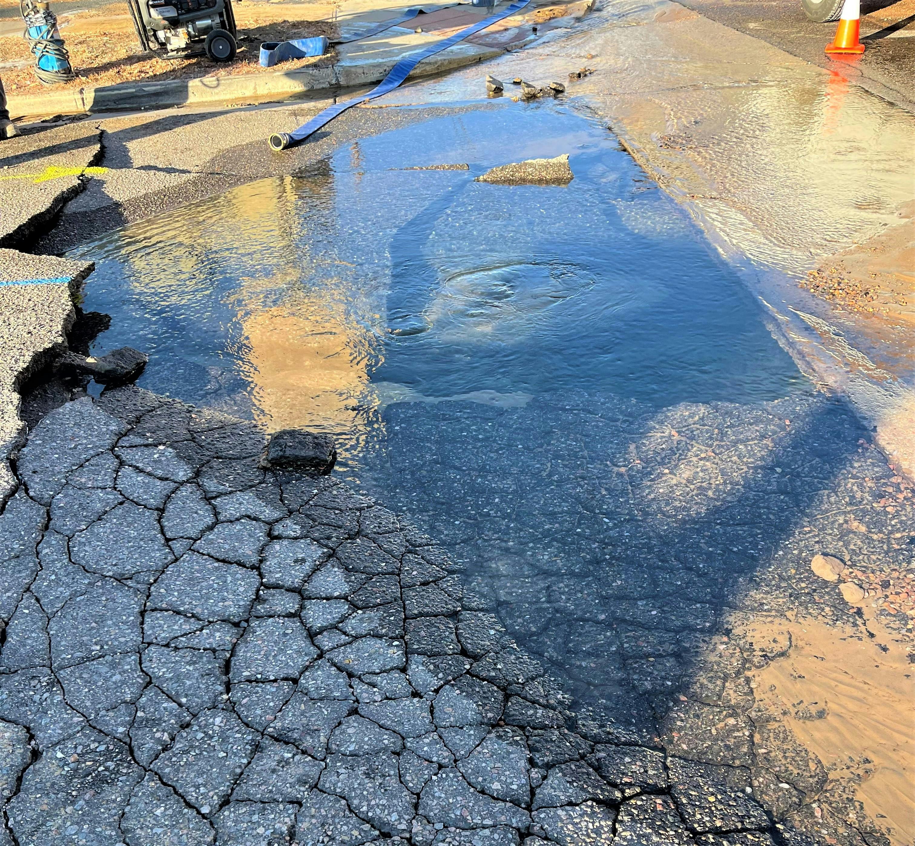 Aftermath of a water main break on Hampden and Washington.