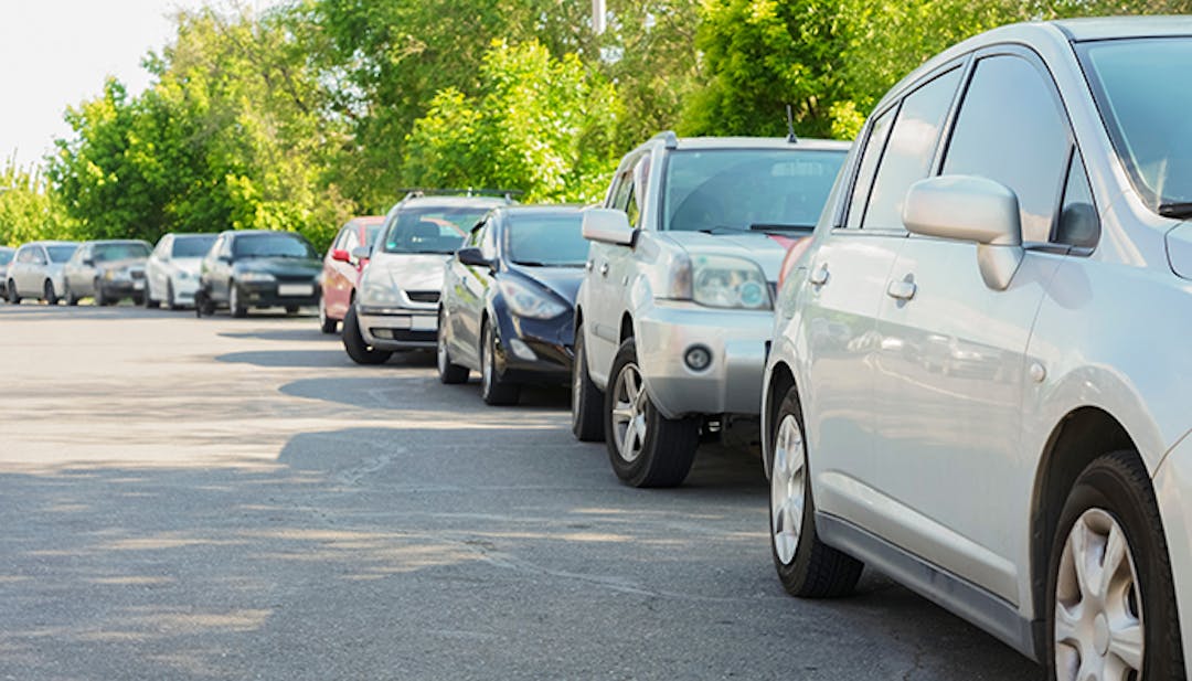 Cars parked on neighborhood street