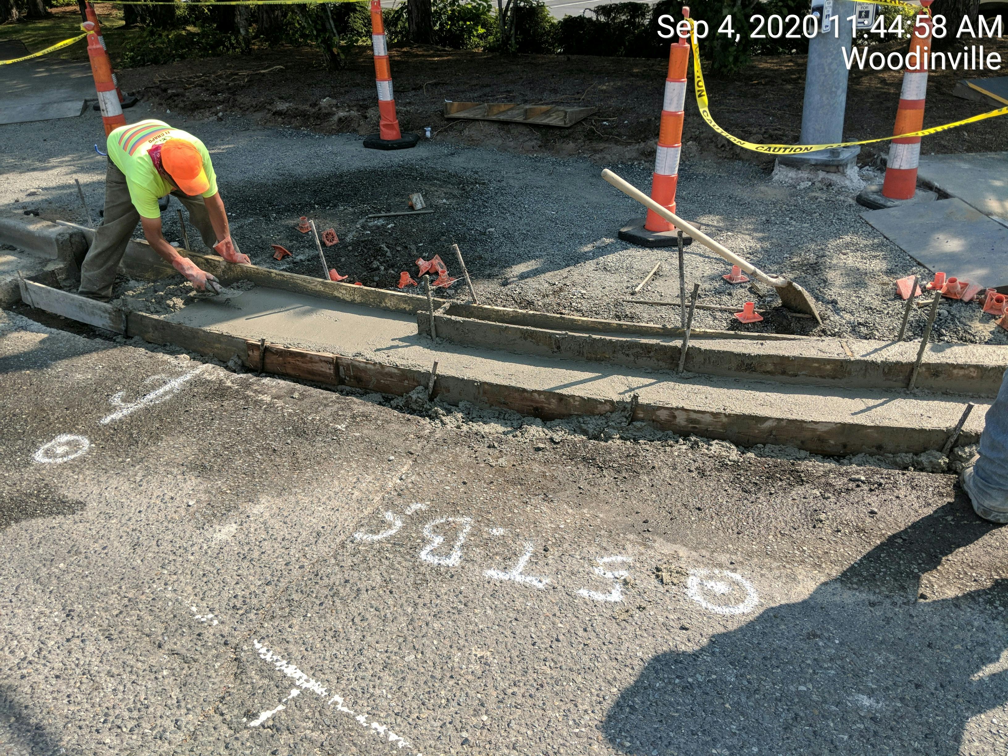Wood-Sno Paving: Finishing curb and gutter on 178th.jpg
