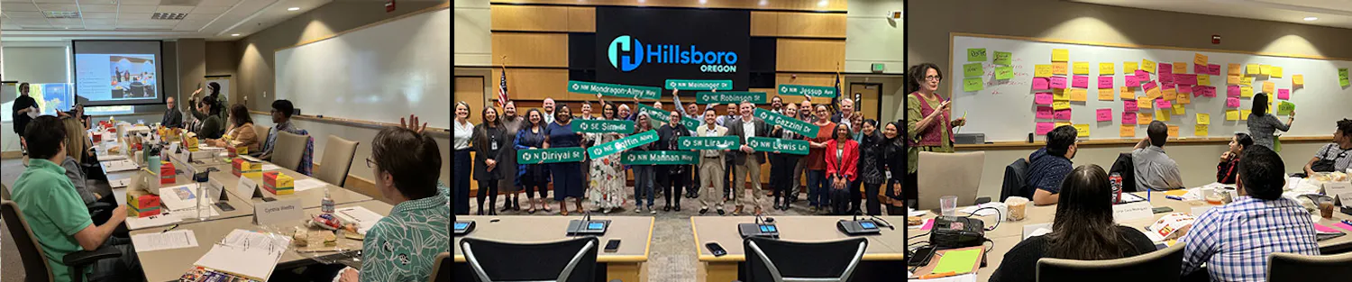 Members of the Civic Leadership Academy hold Hillsboro street signs with their names & interact during a workshop