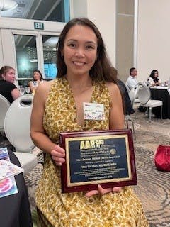 Dr. Chan receiving the Mark Chenven, MD AAP-CA3 Ally Award 2024