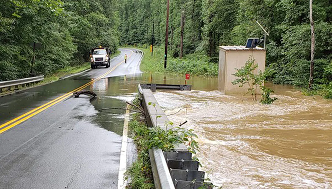 Flooding stream on roadway