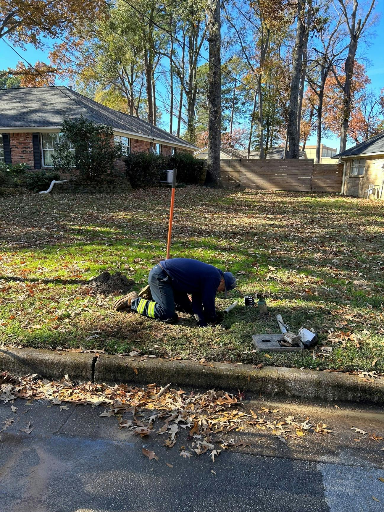 TWU staff working on meter.jpg