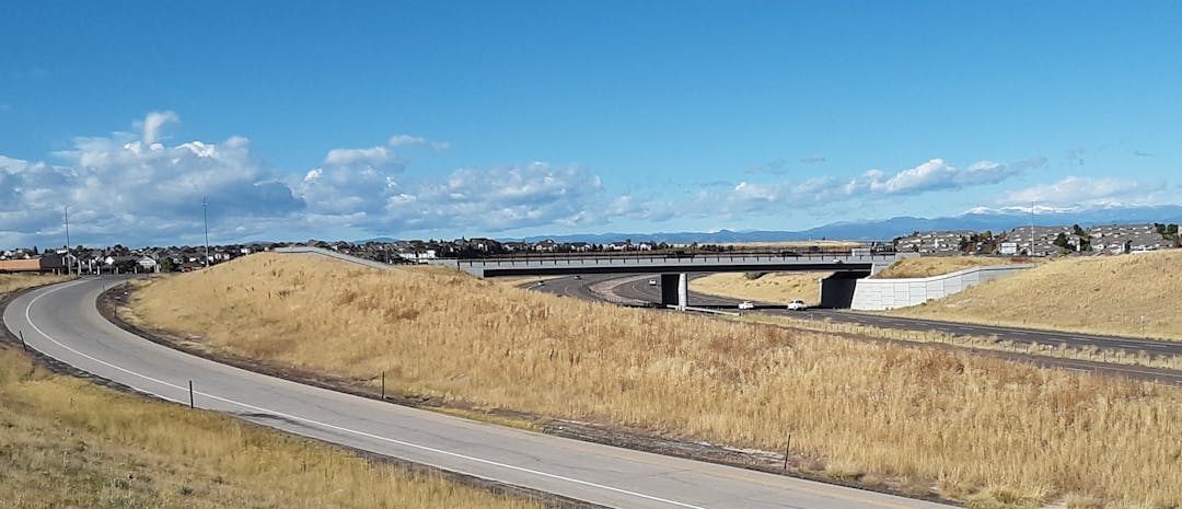 Photo of Gartrell Bridge spanning E-470 and on-ramp to E-470