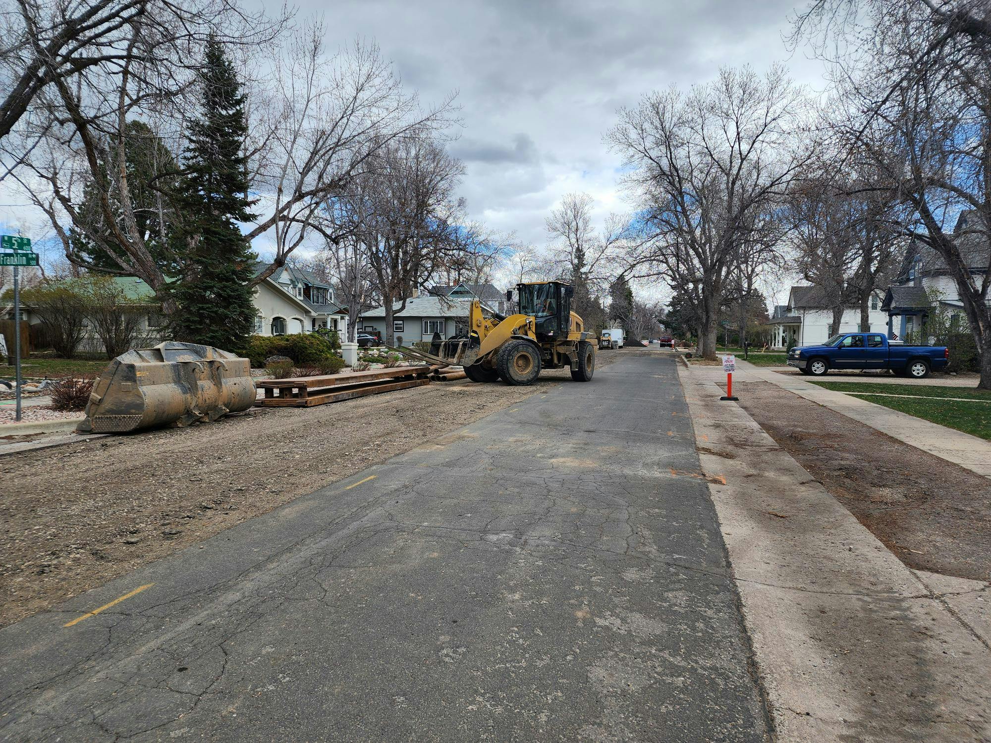 Crews remove the asphalt and prepare 5th Street for the new storm sewer.