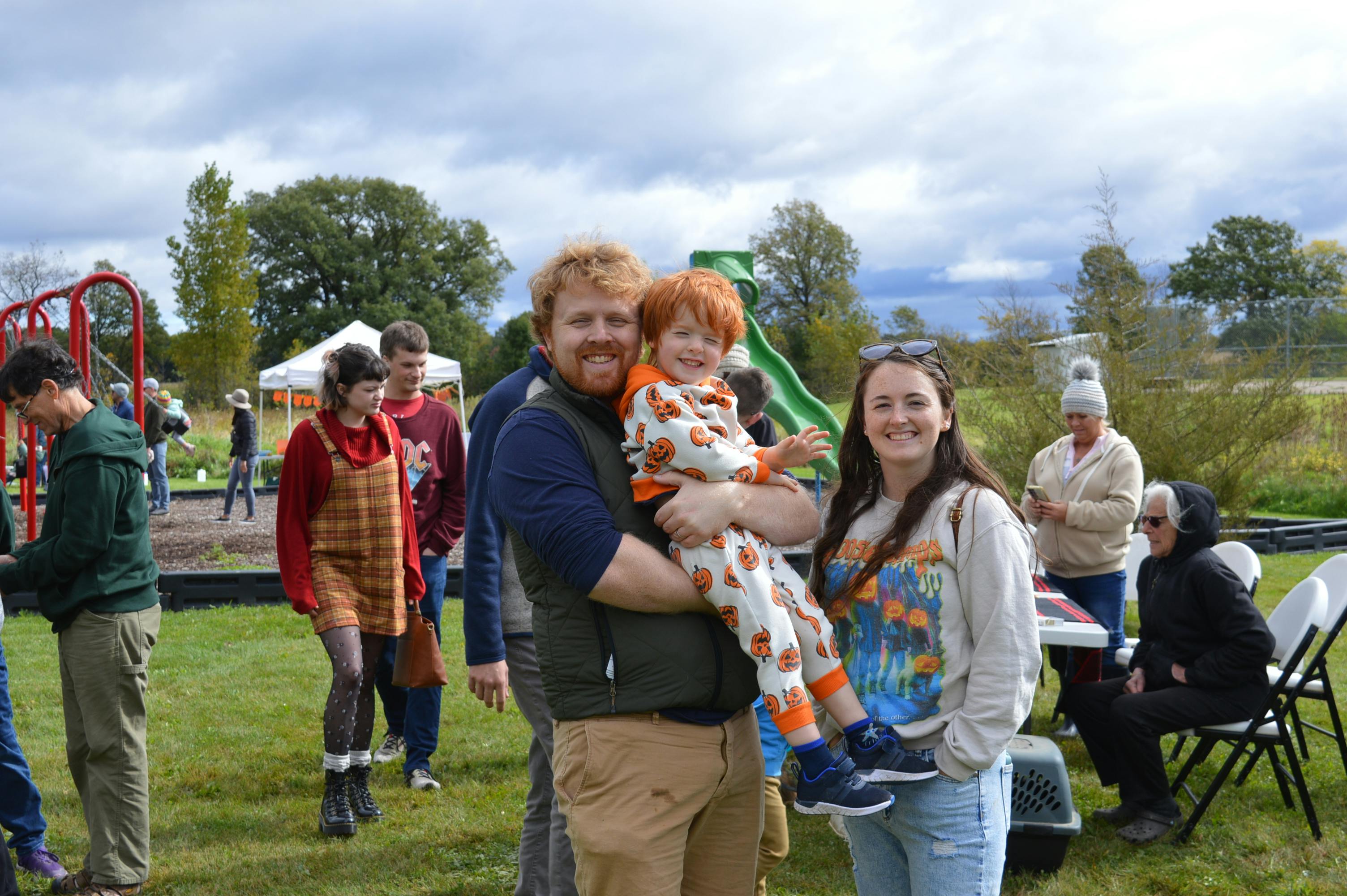 Family moments near the mini petting zoo