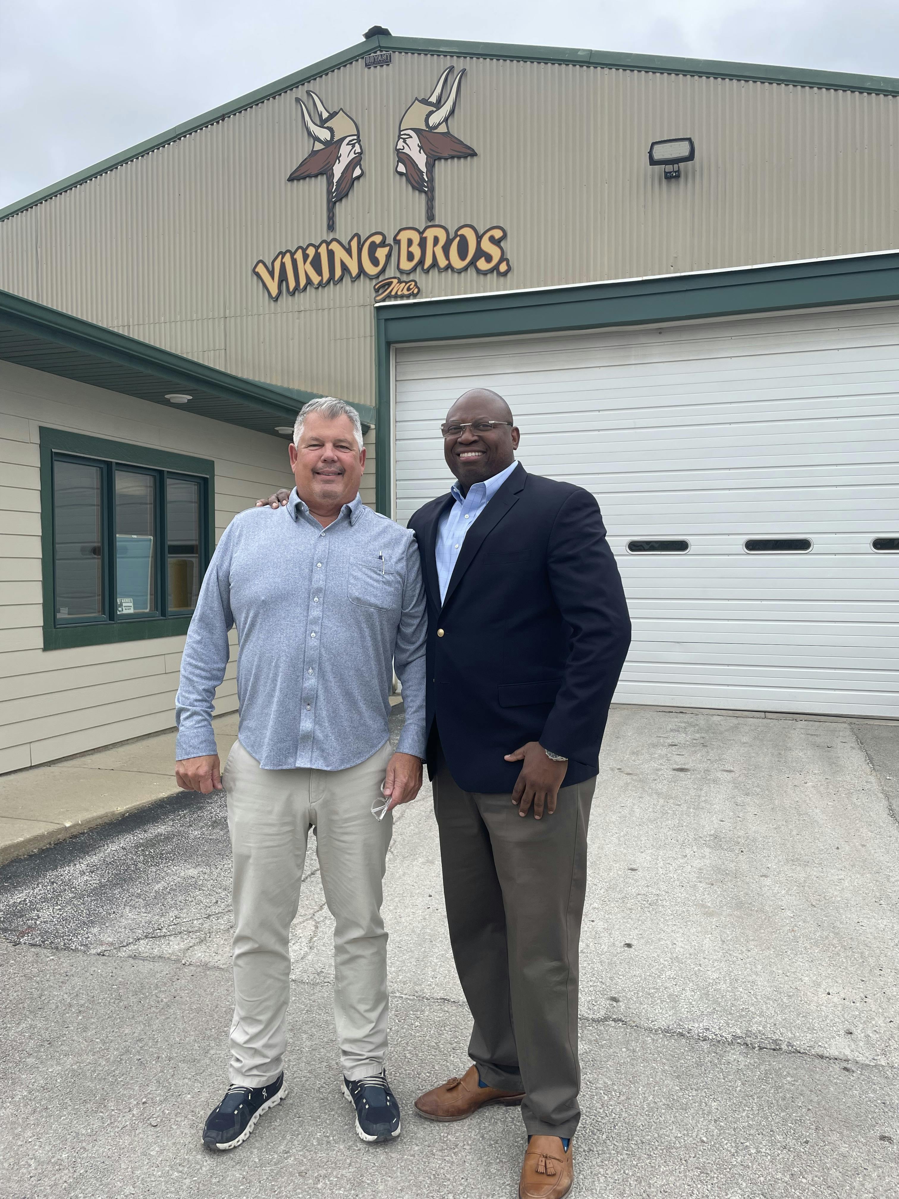 Craig Melby (President of Viking Brothers, Inc.) with Dr. Campbell (City of Aurora, Economic Development Coordinator)