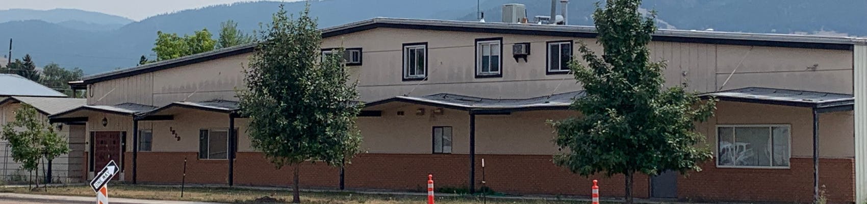 External view of Johnson Street Shelter on summer day