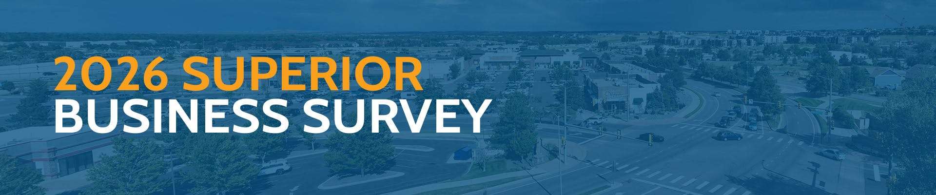 A landscape of neighborhoods streets, featuring words in the foreground that read, "2026 Superior Business Survey."