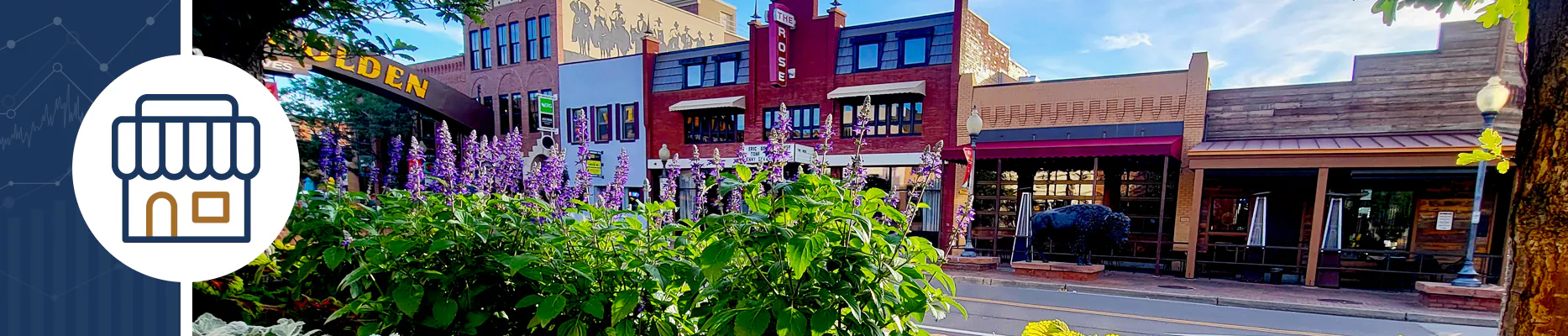 Flowers are in full bloom in downtown Golden, in front of the Welcome Arch and downtown shops.