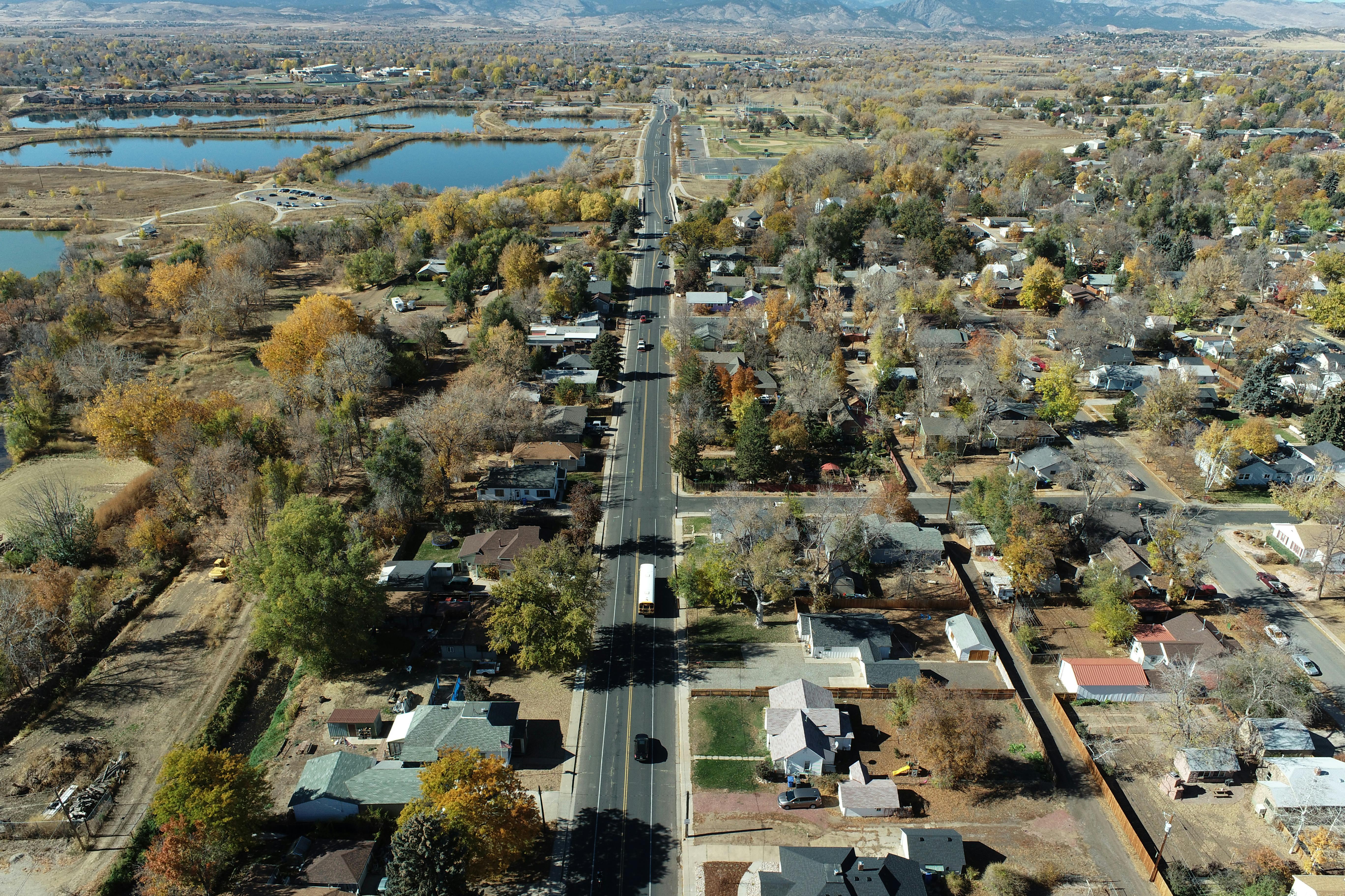Nov. 2021-A birdseye view of W. 1st Street looking west, showing a stretch of road prior to Phase 1 project construction.