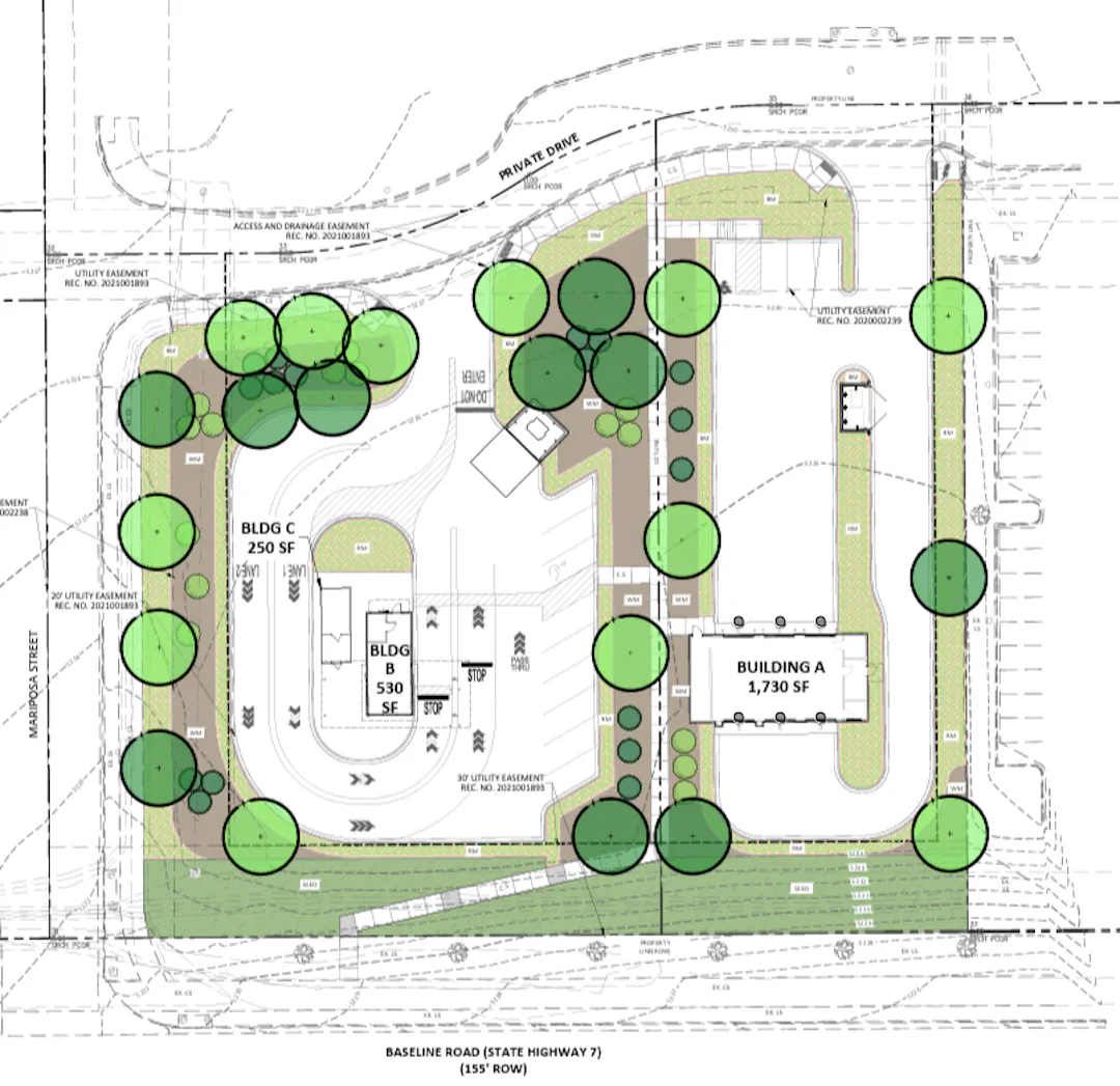 Site plan showing one commercial building to left (north) and a mixed use parcel to right (south)