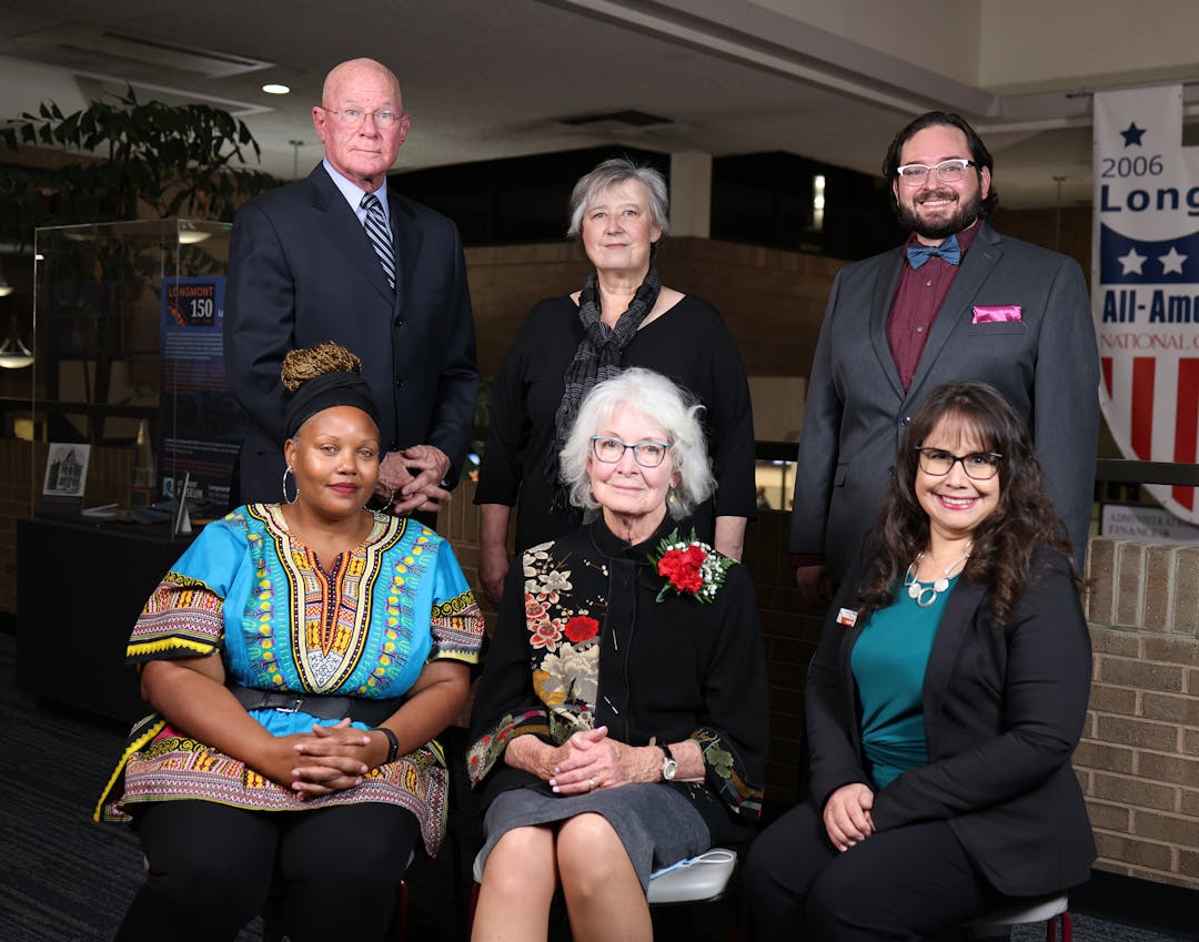Longmont City Council members pose in two rows in the Civic Center mall.