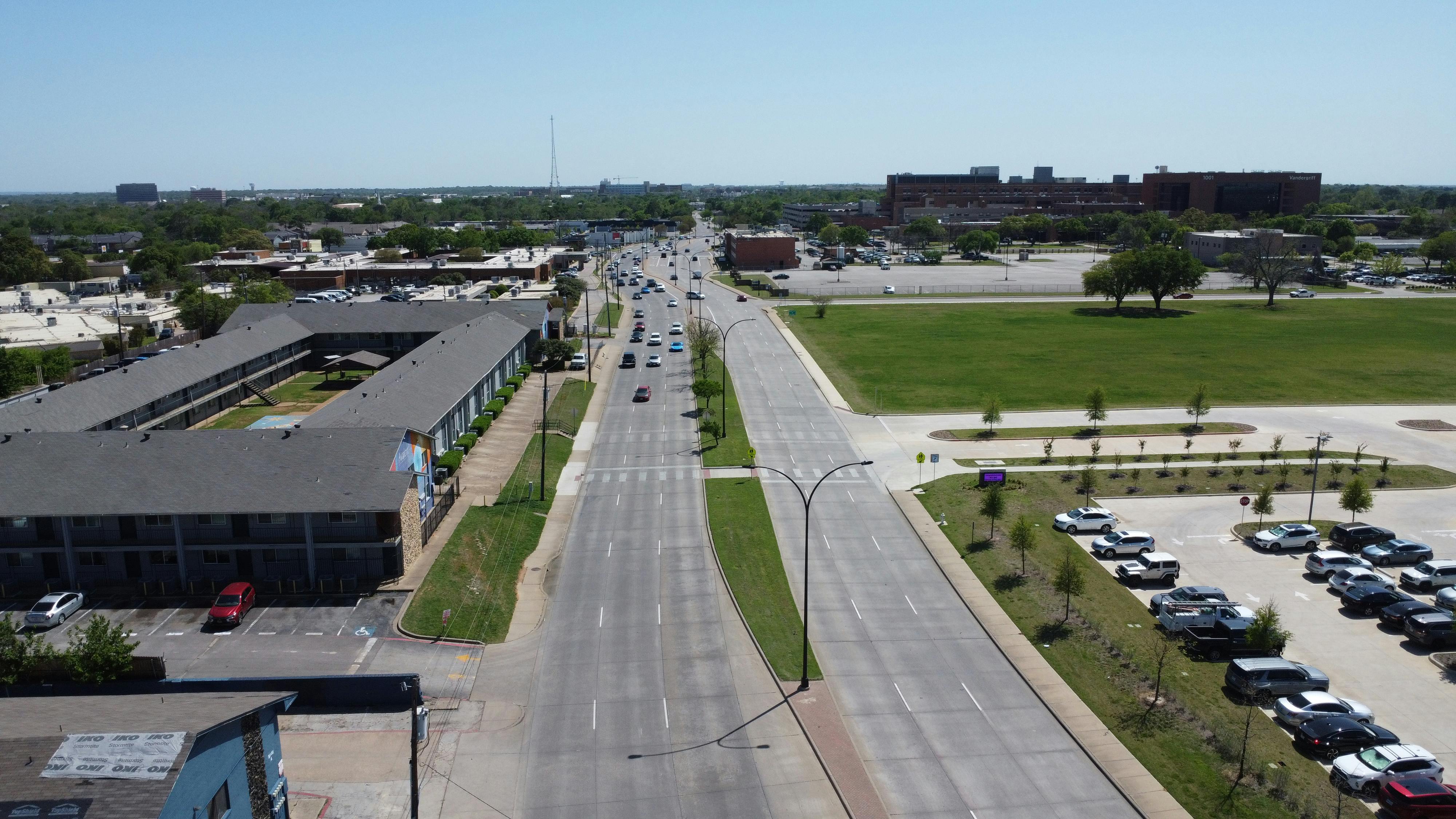 Divided roadway with sidewalks and crosswalks