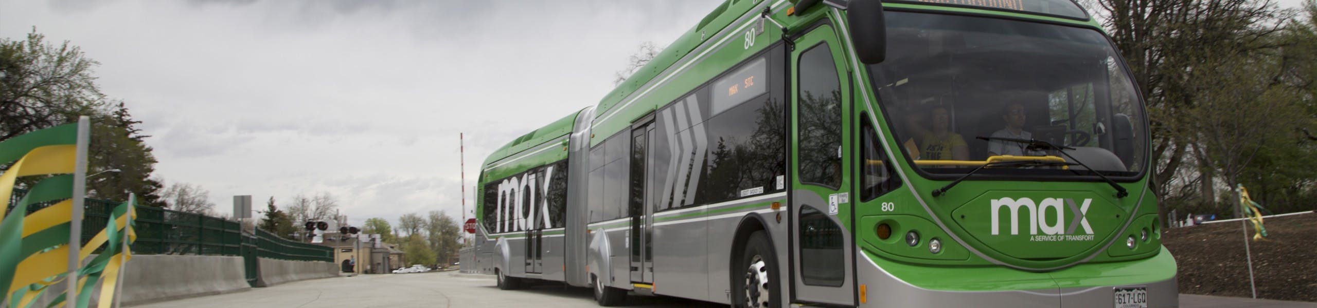 Max bus leaving a station.