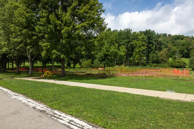A view of the playground construction site from Tennis Court Road.