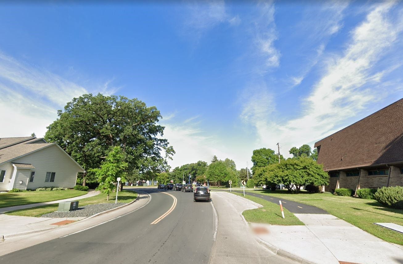 Regional trail adjacent to road and church