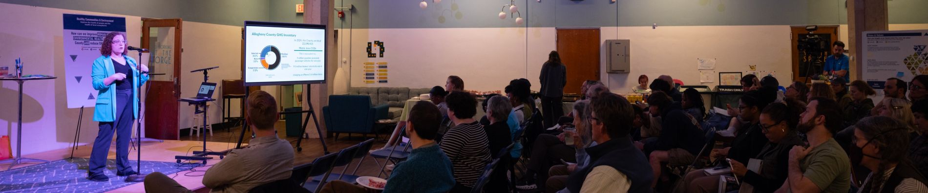 Director of Sustainability addresses the attendees of the Climate Action Plan public meetings