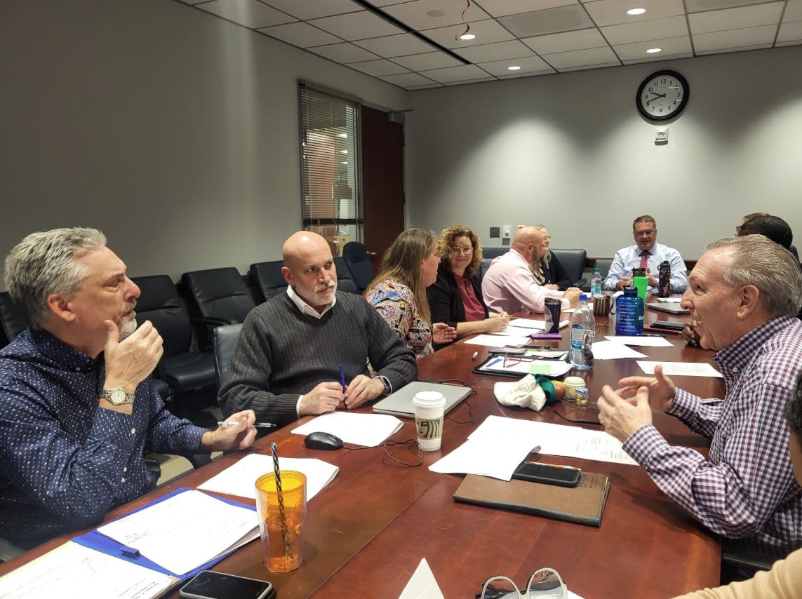 Strategic Management Plan Team meeting .png