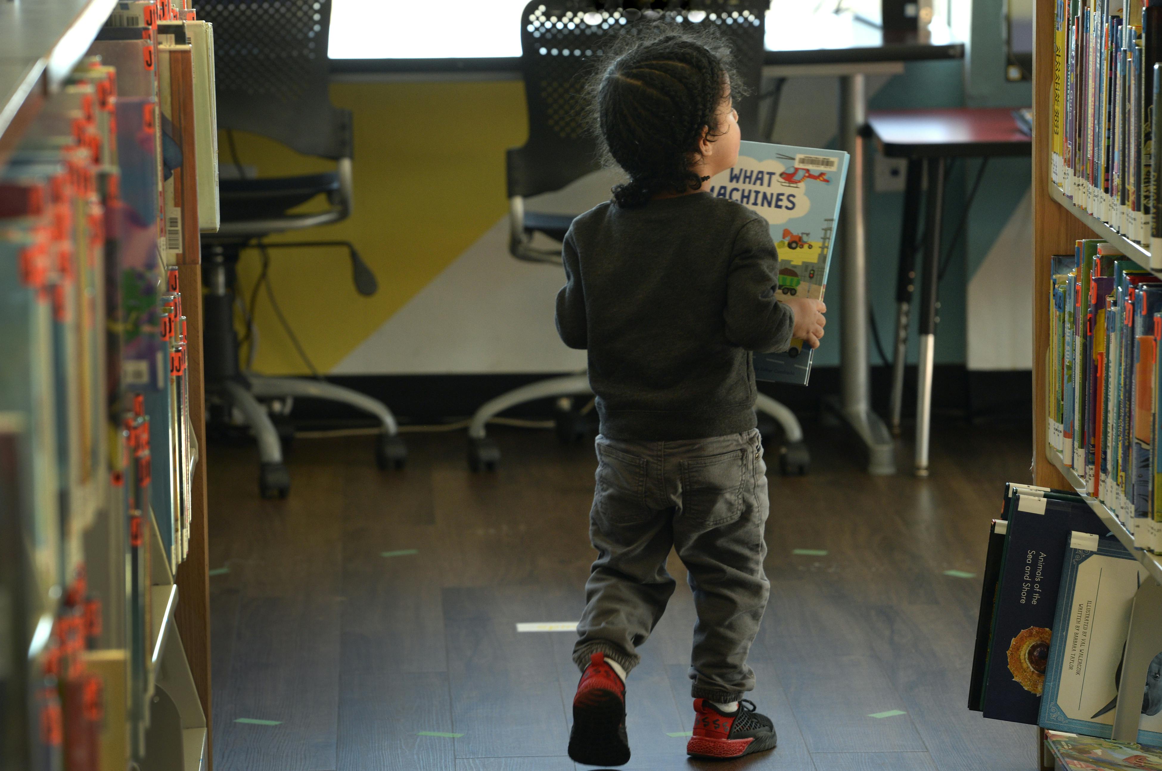 A child holding a book 