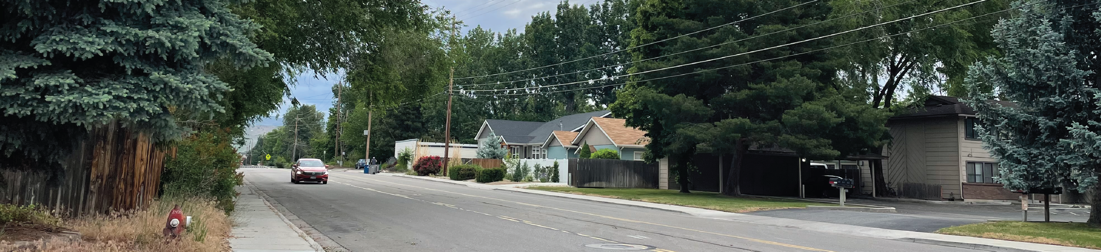 Picture of Rose Hill Street with car.