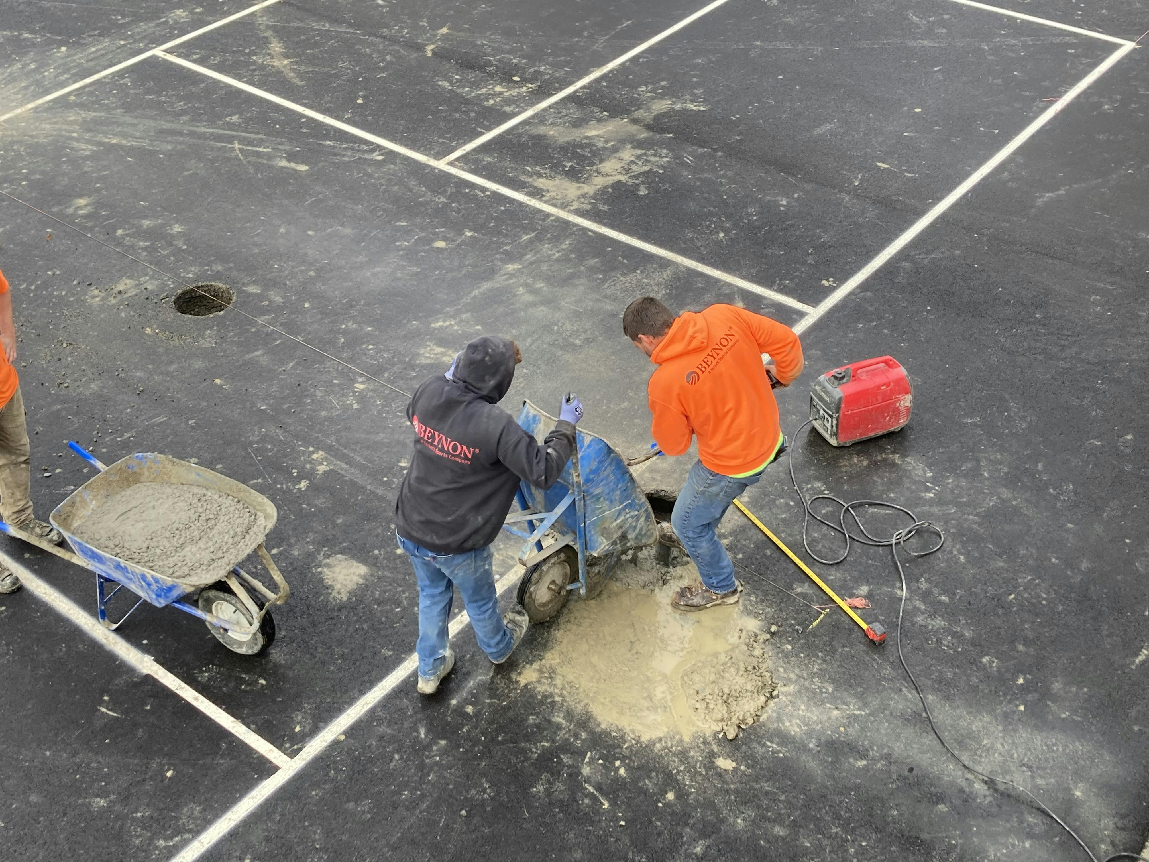 Pouring concrete for net post footings