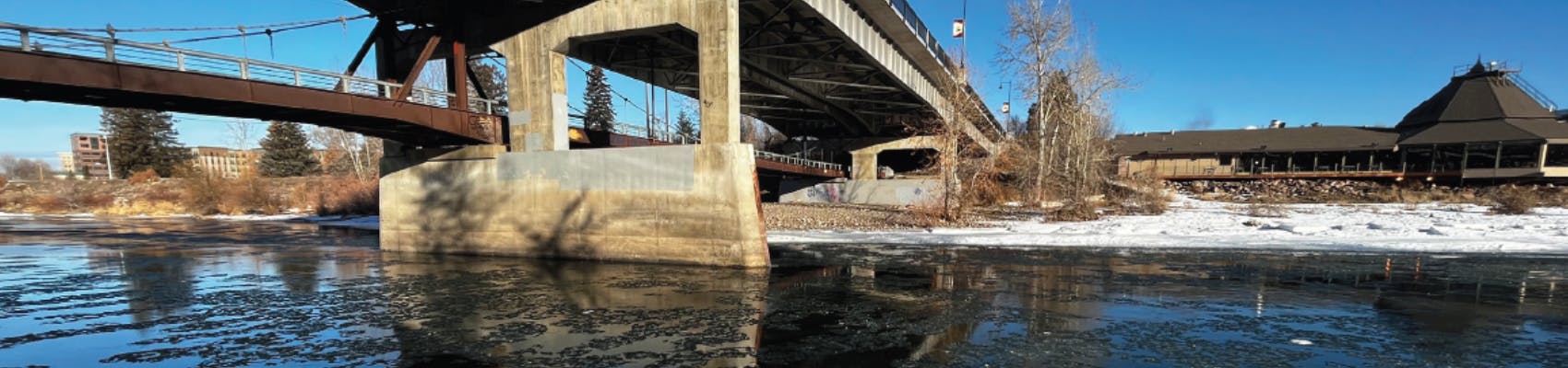 View of Clark Fork River in winter near Hilton Double Tree and bridge