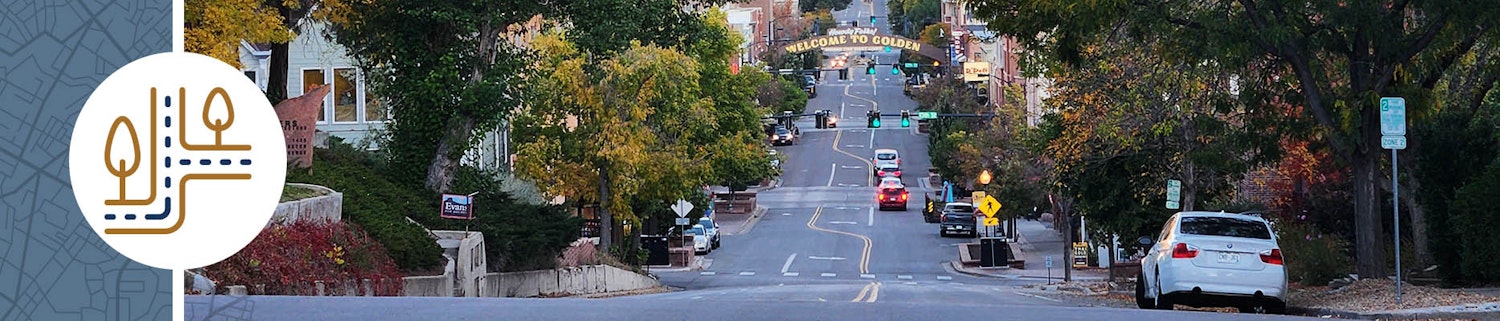Busy street in Golden with cars on the street.
