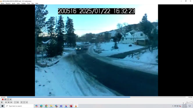 Two cars pass successfully in the narrowest part of the Pinal road following sidewalk construction.